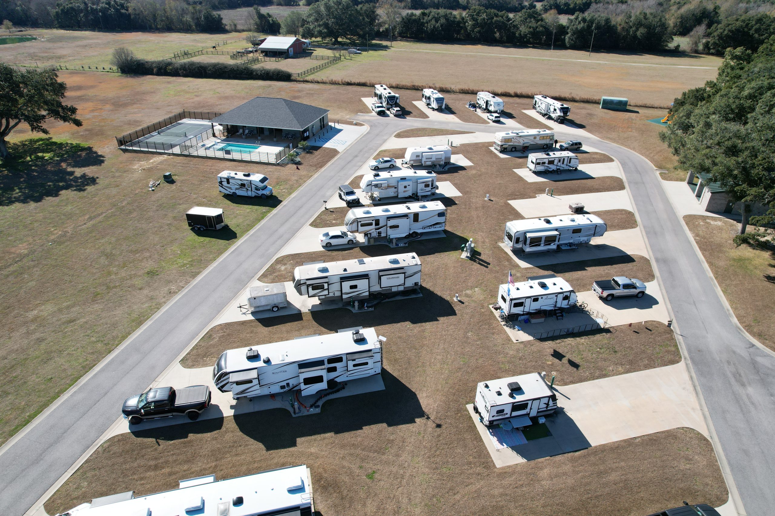 Picture of new swimming pool, pickleball court and events center at Homestead RV Community