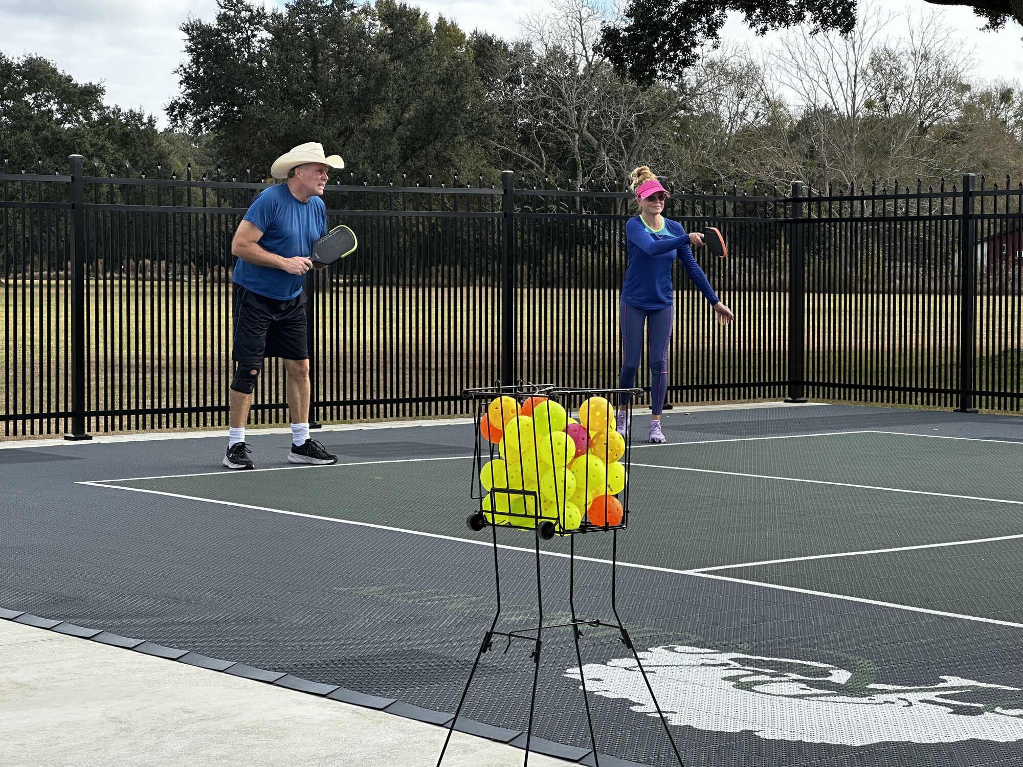 Ed O Bridgman and his wife play pickle ball hat Homestead RV Community