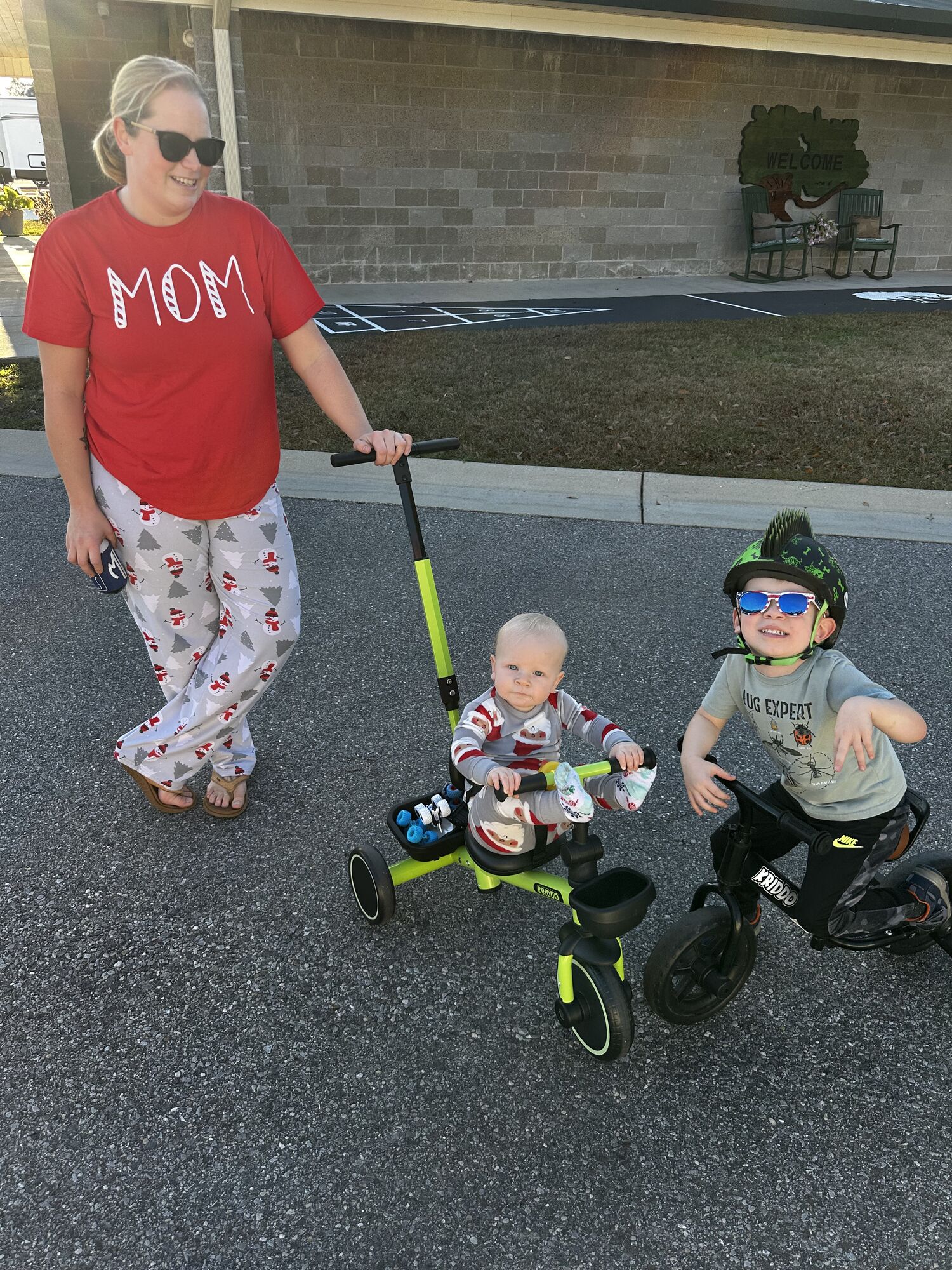 Guest_with_kids (1) Mom and he childern enjoy a stroll around Homestead RV Community