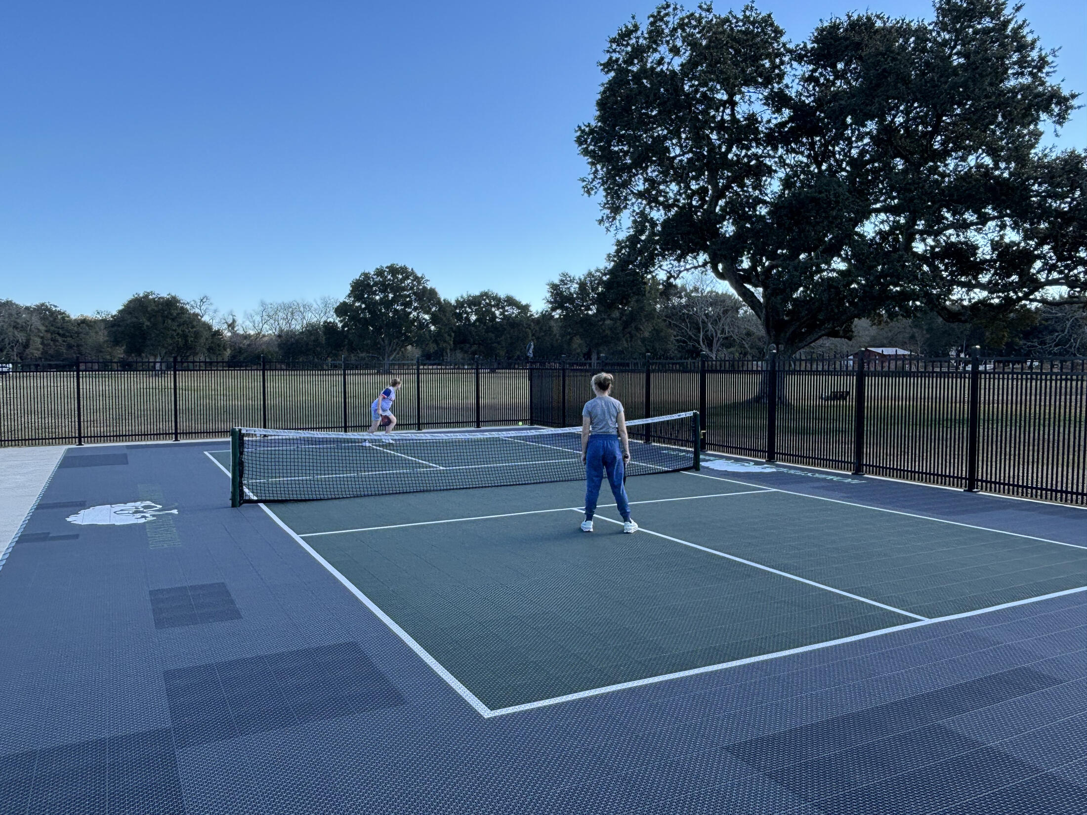 Kids playing pickle ball at Homestead RV Comminity near Dalphin Island AL